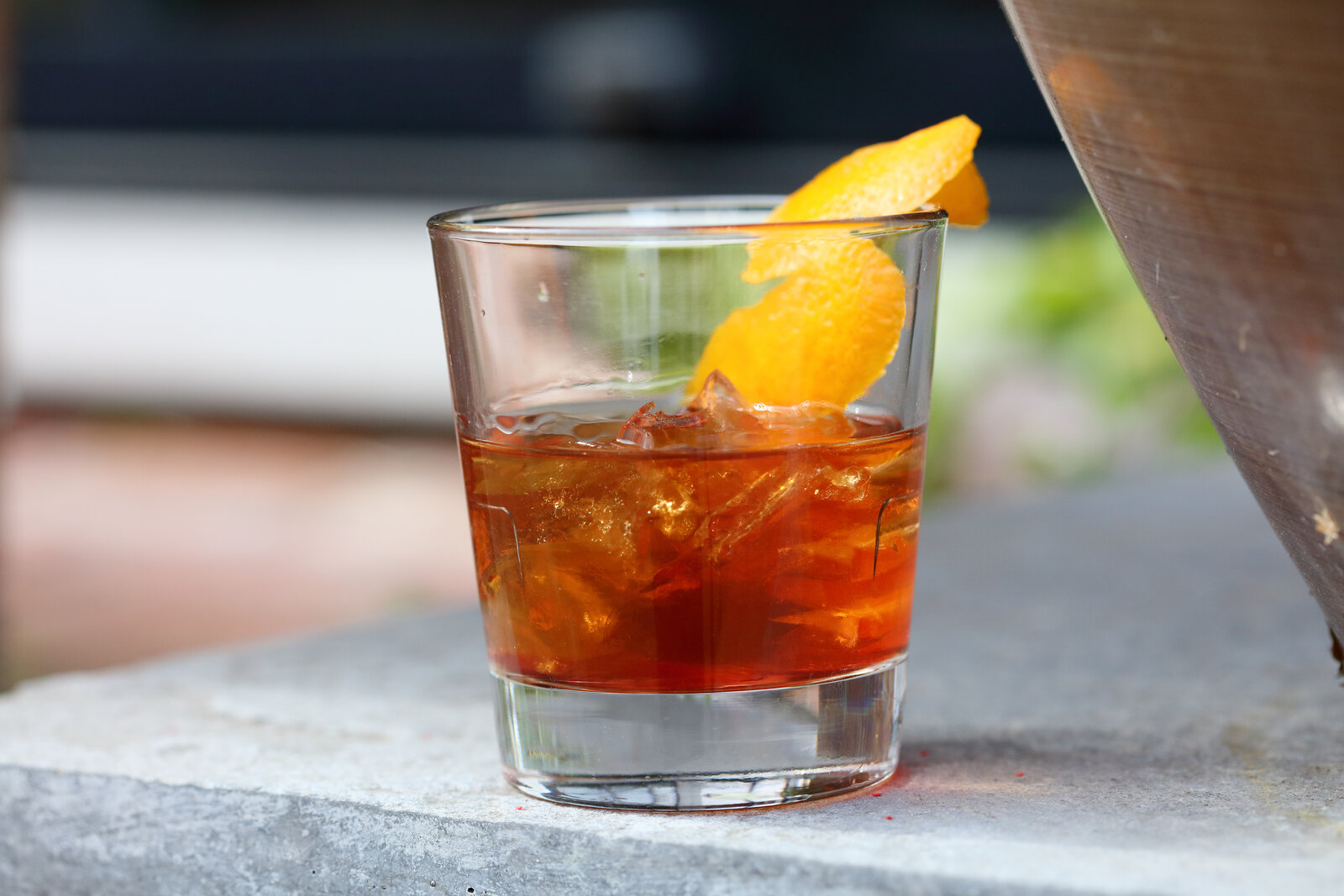 An old fashioned with orange peel
