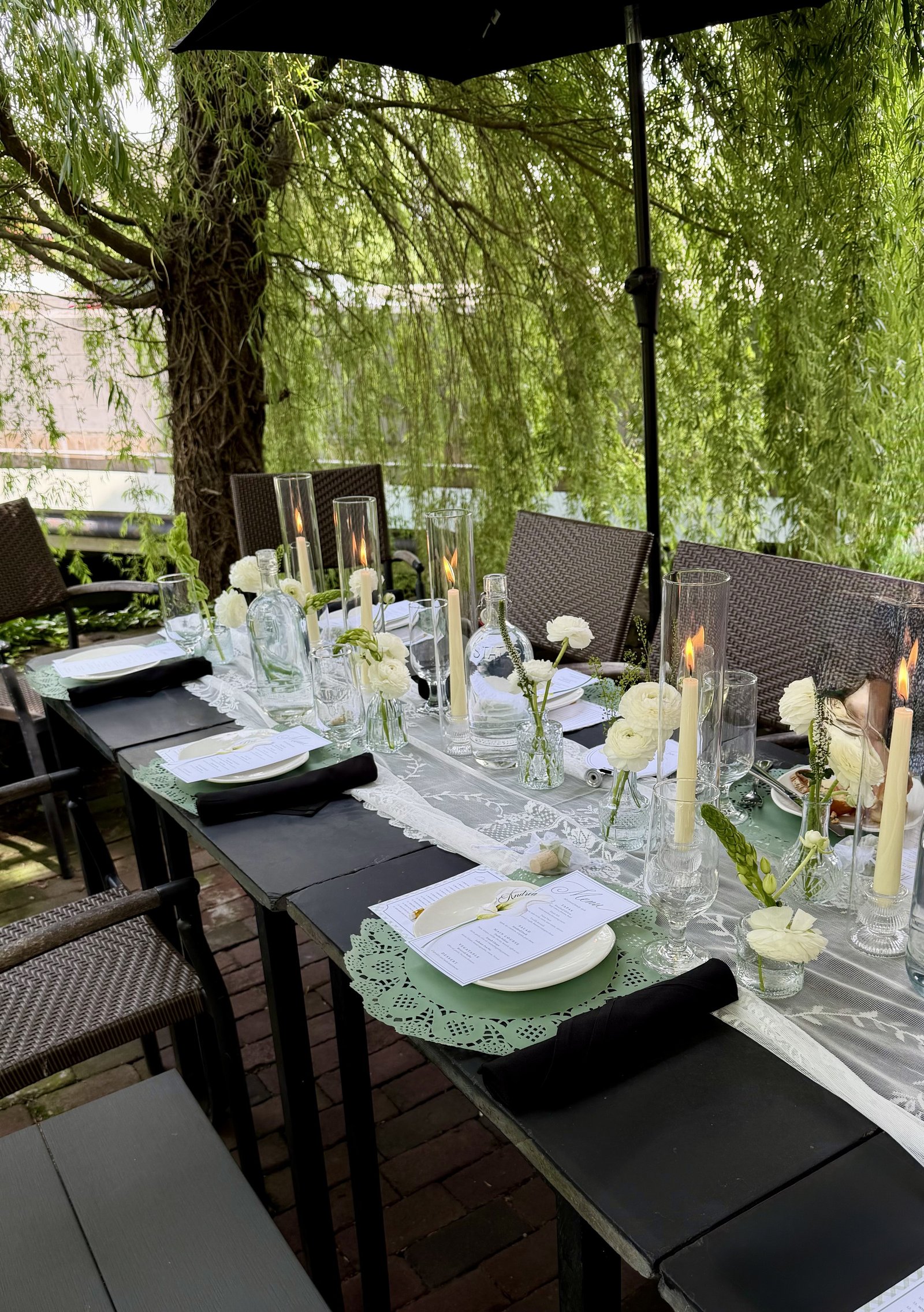 Candlelit tablescape beneath the willow tree