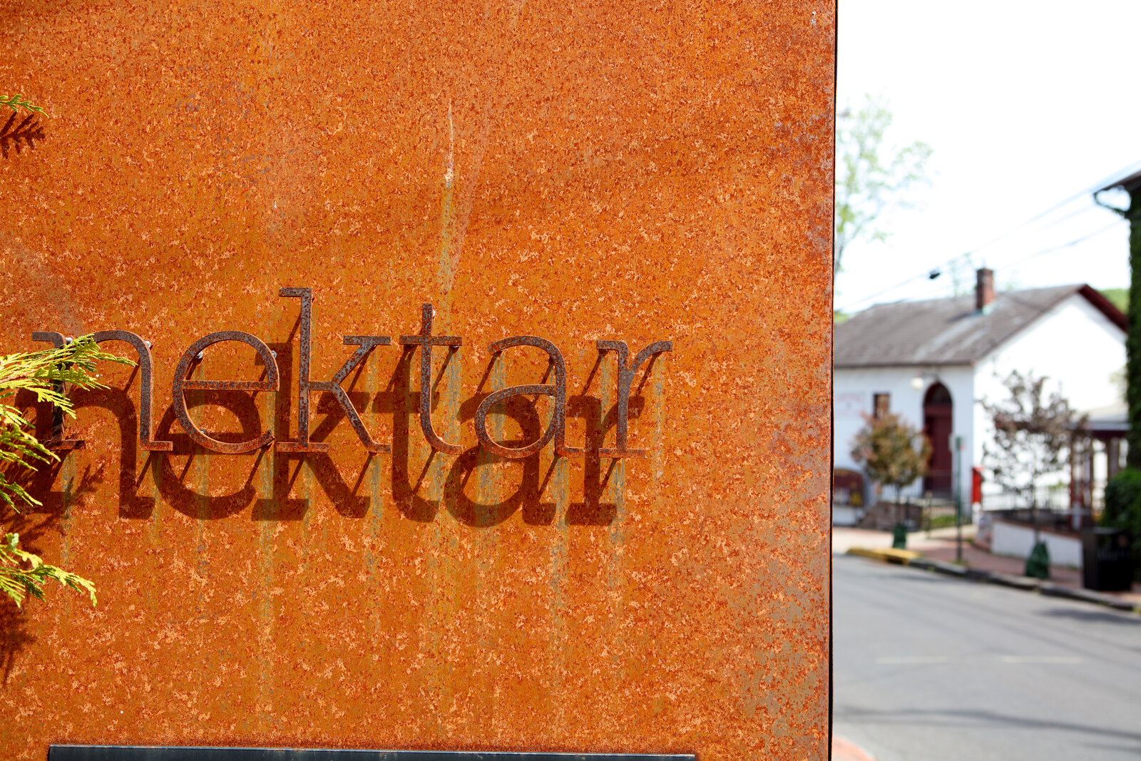 The rust-corten nektar sign on Mechanic Street, New Hope