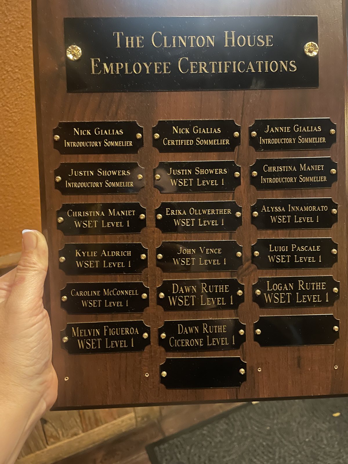 The Clinton House employee certification plaque — Sommelier, WSET, and Cicerone.