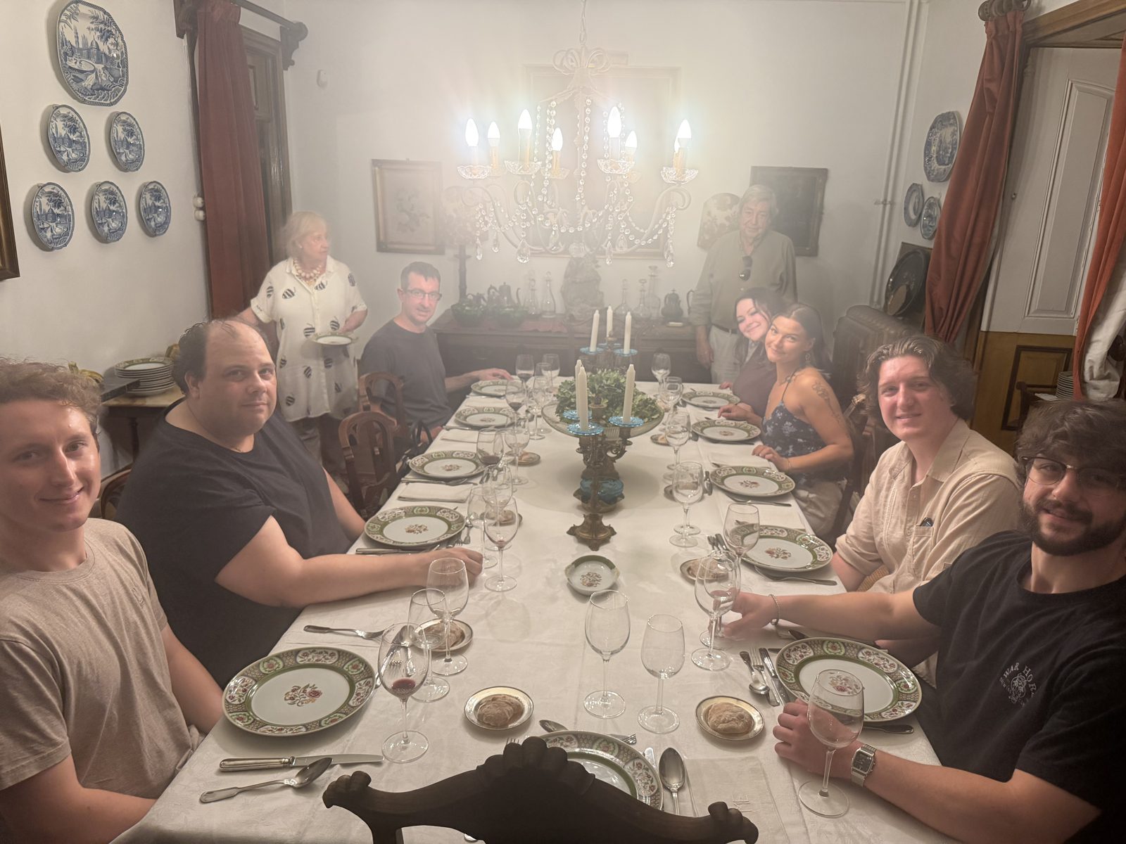 A candlelit dinner in the manor house.
