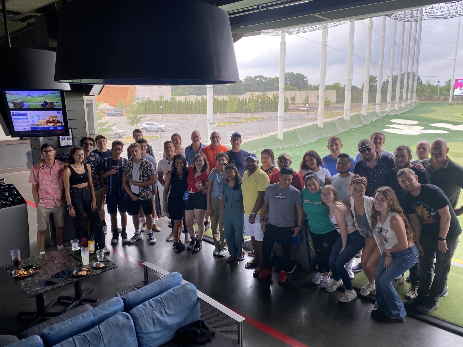 The whole crew out at TopGolf.
