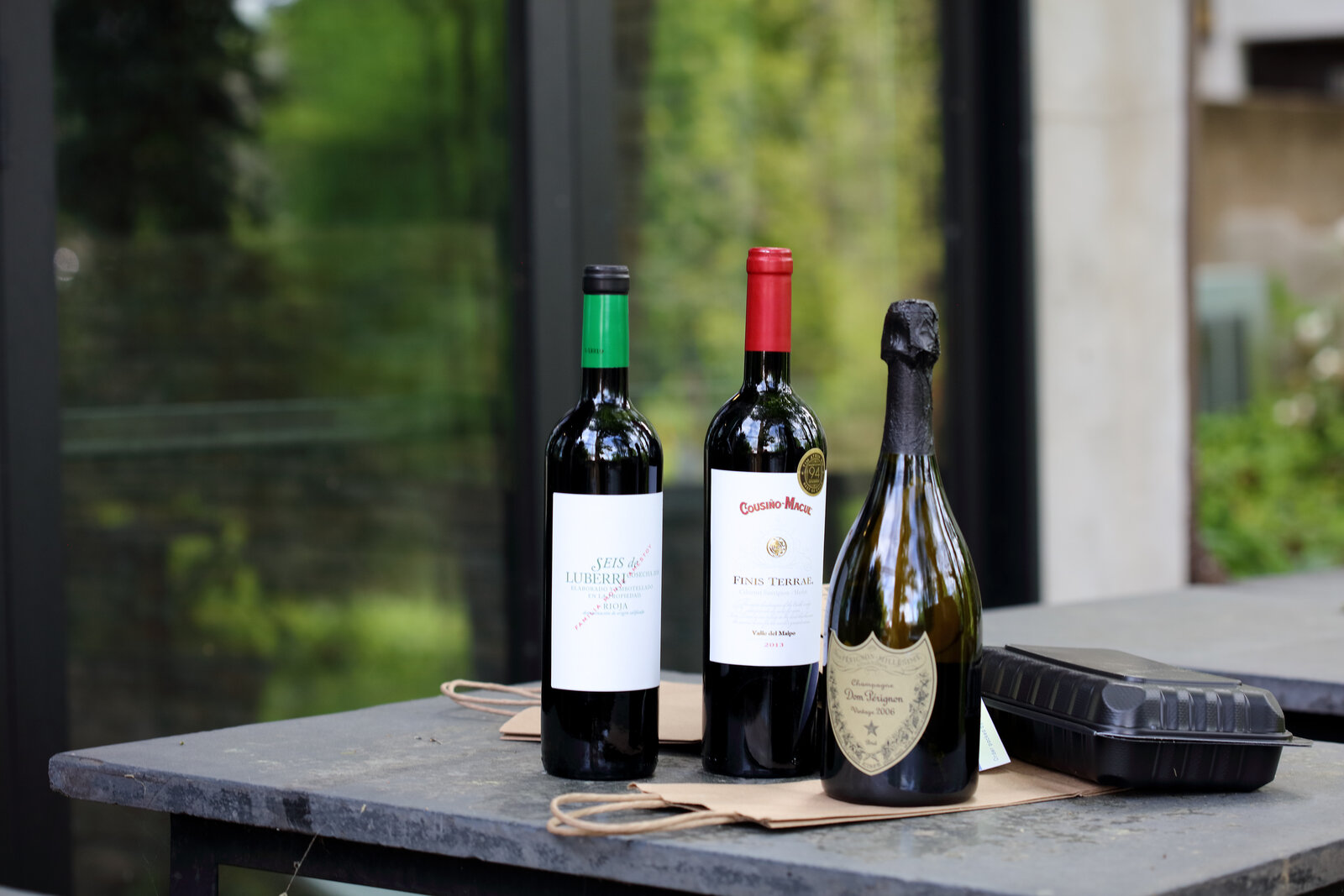 Two reds and a bottle of Dom Pérignon