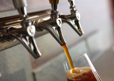 Pouring beer from a tap